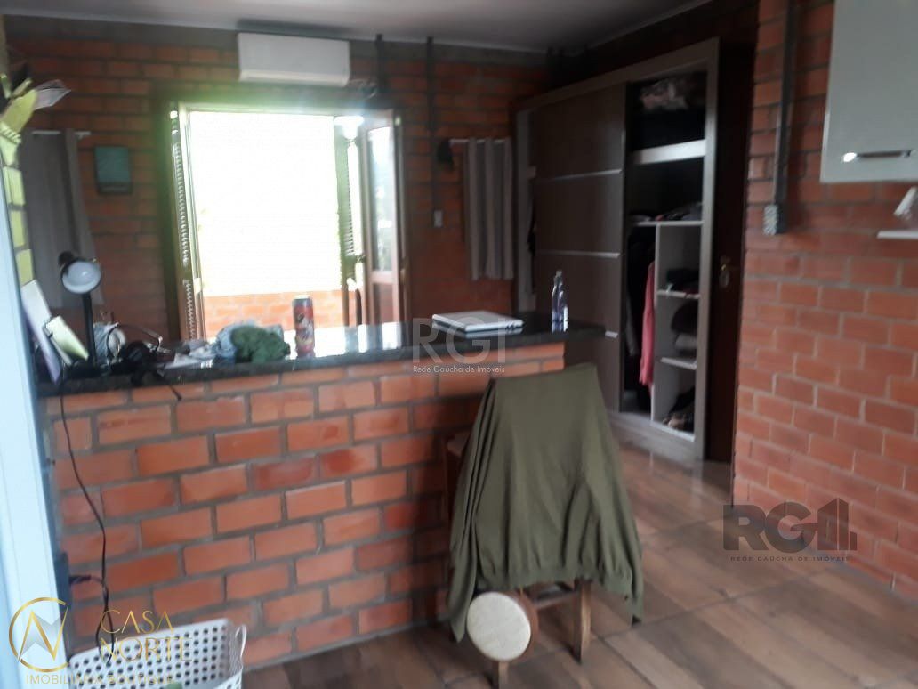 Casa à venda com 3 quartos, 90m², 1 suíte, 2 vagas, Rua Germano Bonow Filho no bairro Hípica em Porto Alegre