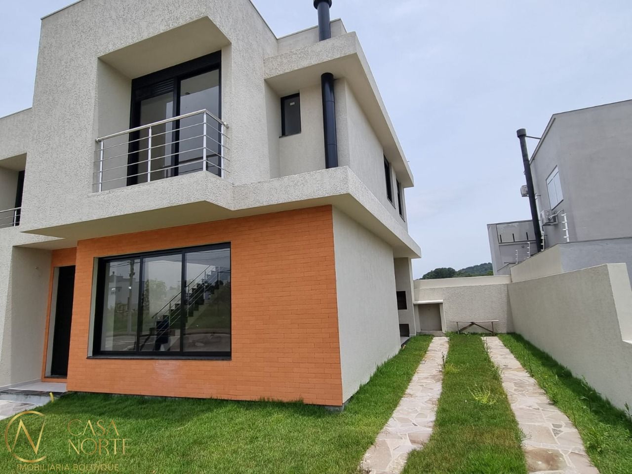 Casa à venda com 3 quartos, 145m², 1 suíte, 3 vagas, Rua Farid Germano no bairro Hípica em Porto Alegre