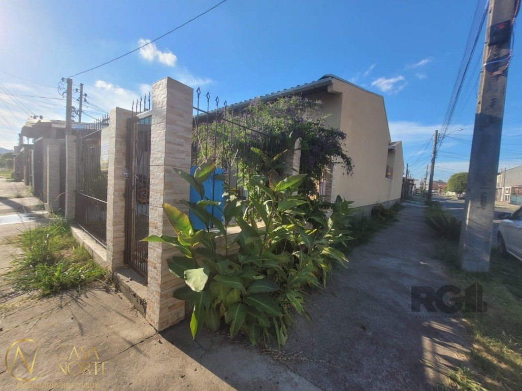 Casa à venda com 3 quartos, 110m², 2 vagas, Rua Antônio Ribeiro Messias no bairro Hípica em Porto Alegre