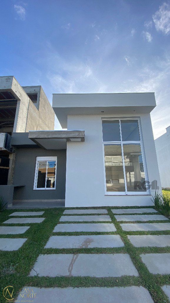 Casa de Condomínio à venda com 3 quartos, 103m², 1 suíte, 2 vagas, Rua Monsenhor Augusto Dalvit no bairro Aberta dos Morros em Porto Alegre