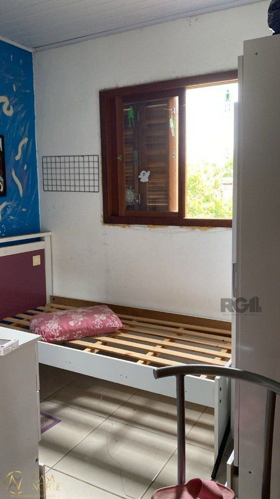 Casa à venda com 2 quartos, 60m², 3 vagas, Rua dos Flamboaiãs no bairro Ponta Grossa em Porto Alegre