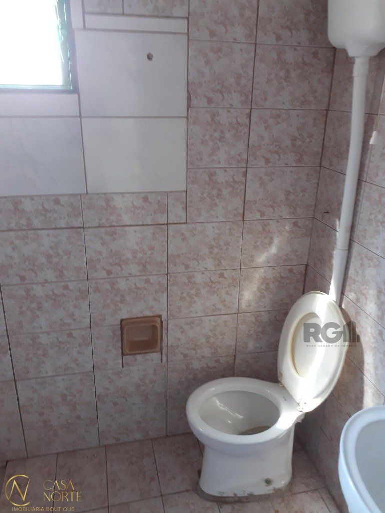 Casa à venda com 3 quartos, 125m², 3 vagas, Estrada Barro Vermelho no bairro Restinga em Porto Alegre