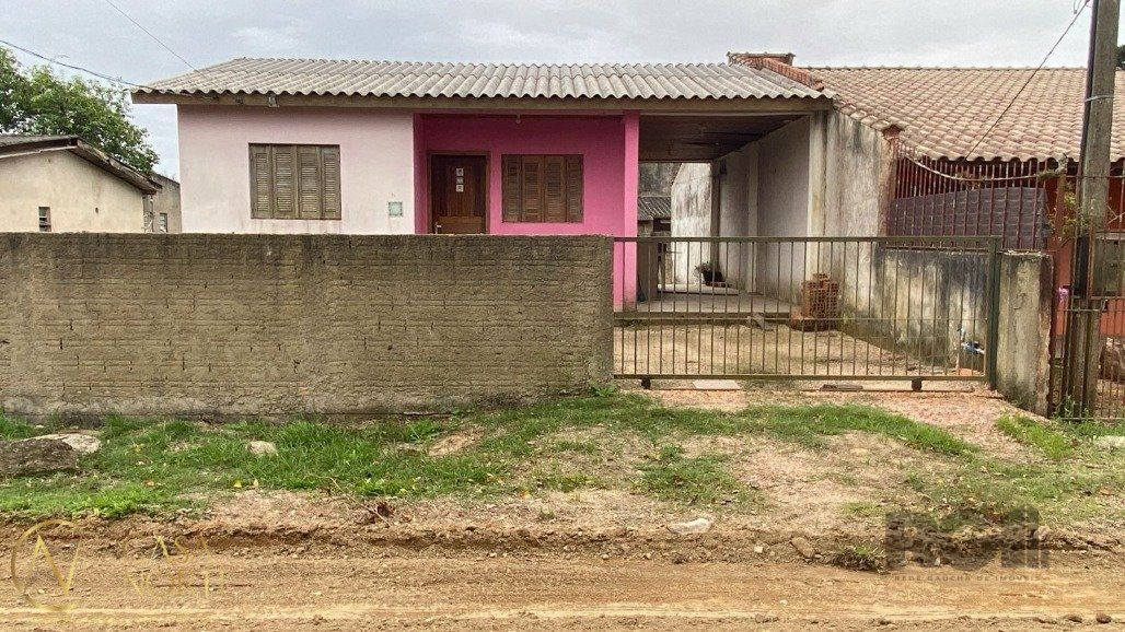 Casa à venda com 2 quartos, 60m², 3 vagas, Rua dos Flamboaiãs no bairro Ponta Grossa em Porto Alegre