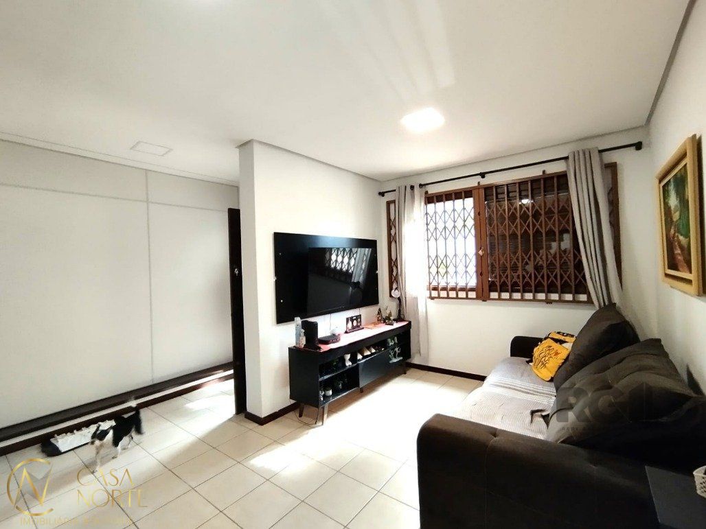 Casa à venda com 3 quartos, 170m², 1 suíte, 3 vagas, Rua Ari Peixoto Martins no bairro Espírito Santo em Porto Alegre