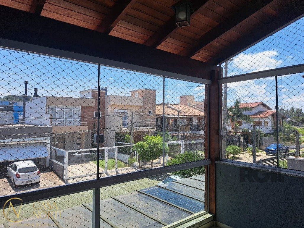 Casa à venda com 3 quartos, 156m², 1 suíte, 2 vagas, Rua Aldo Sani no bairro Hípica em Porto Alegre