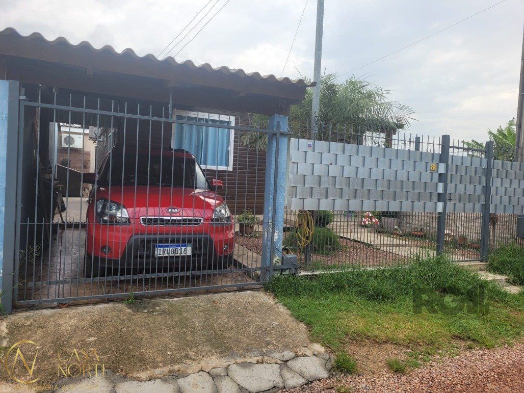 Casa à venda com 2 quartos, 100m², 1 vaga, Rua Luan Jacoby no bairro Ponta Grossa em Porto Alegre