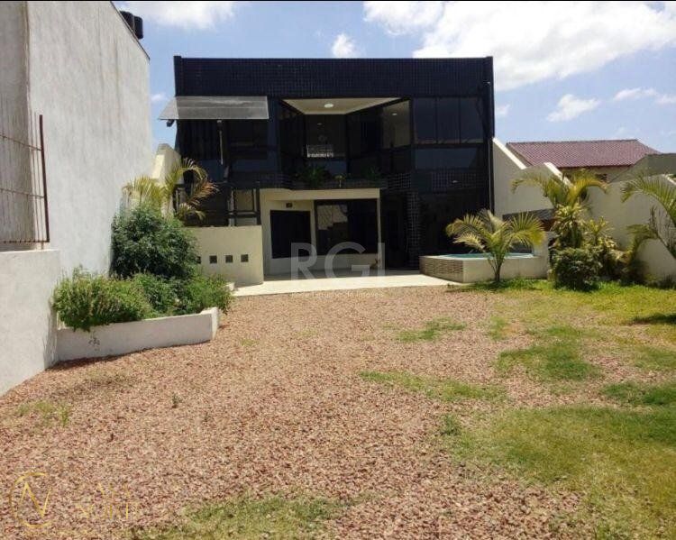 Casa Comercial à venda , 106m², Rua Zuzu Angel no bairro Hípica em Porto Alegre