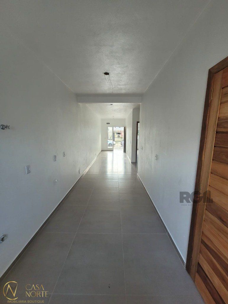 Casa à venda com 3 quartos, 63m², 1 suíte, 1 vaga, Rua Hesiodo Andrade no bairro Hípica em Porto Alegre