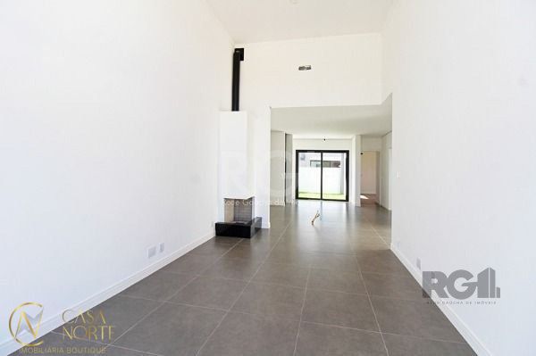 Casa de Condomínio à venda com 3 quartos, 98m², 1 suíte, 2 vagas, Rua Jean Vardaramatos no bairro Hípica em Porto Alegre