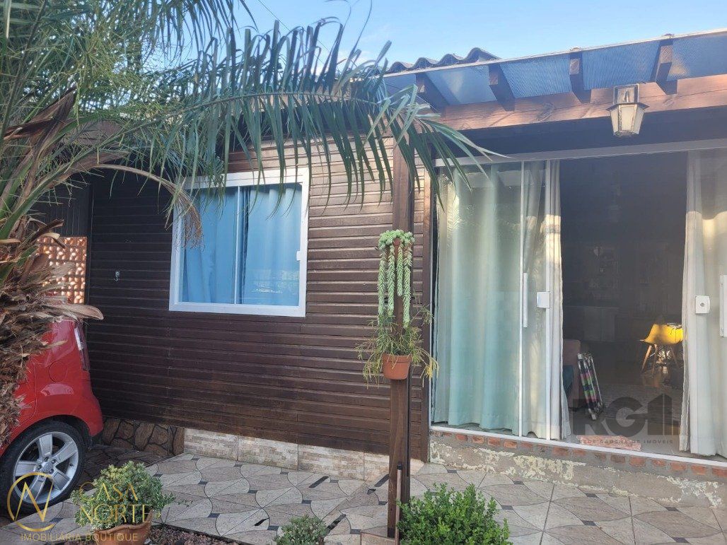 Casa à venda com 2 quartos, 100m², 1 vaga, Rua Luan Jacoby no bairro Ponta Grossa em Porto Alegre