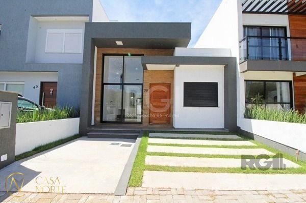 Casa de Condomínio à venda com 3 quartos, 98m², 1 suíte, 2 vagas, Rua Jean Vardaramatos no bairro Hípica em Porto Alegre