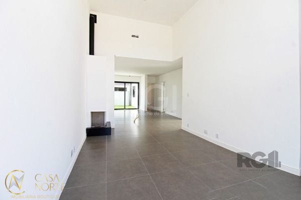 Casa de Condomínio à venda com 3 quartos, 98m², 1 suíte, 2 vagas, Rua Jean Vardaramatos no bairro Hípica em Porto Alegre