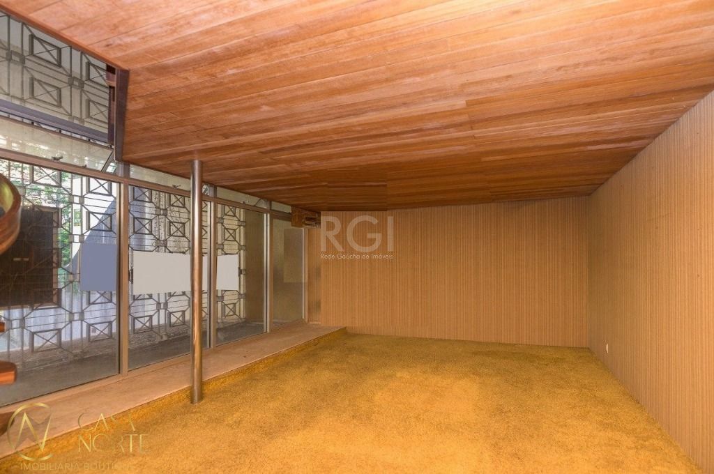Casa à venda com 4 quartos, 388m², 3 suítes, 4 vagas, Rua Pedro Chaves Barcelos no bairro Auxiliadora em Porto Alegre