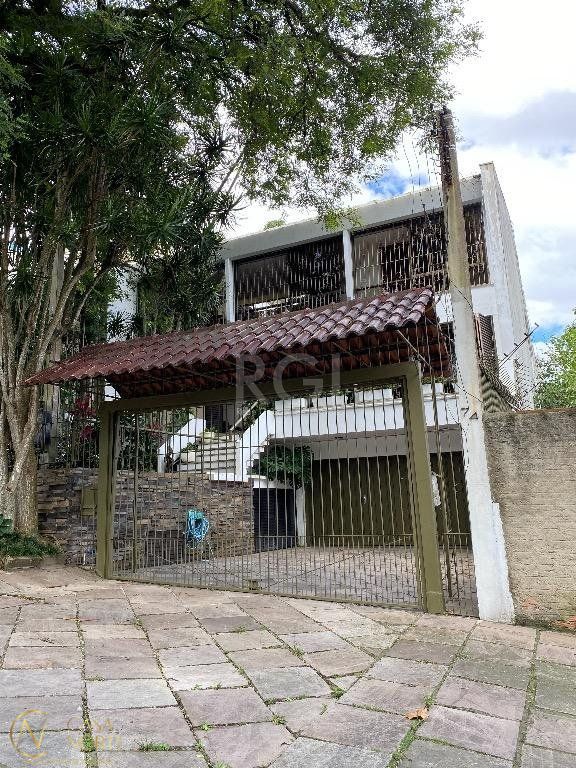 Casa à venda com 3 quartos, 526m², 1 suíte, 5 vagas, Avenida Icaraí no bairro Cristal em Porto Alegre
