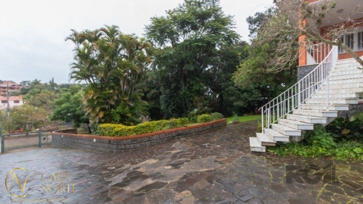 Casa à venda com 4 quartos, 611m², 2 suítes, 4 vagas, Avenida Pereira Passos no bairro Vila Assunção em Porto Alegre