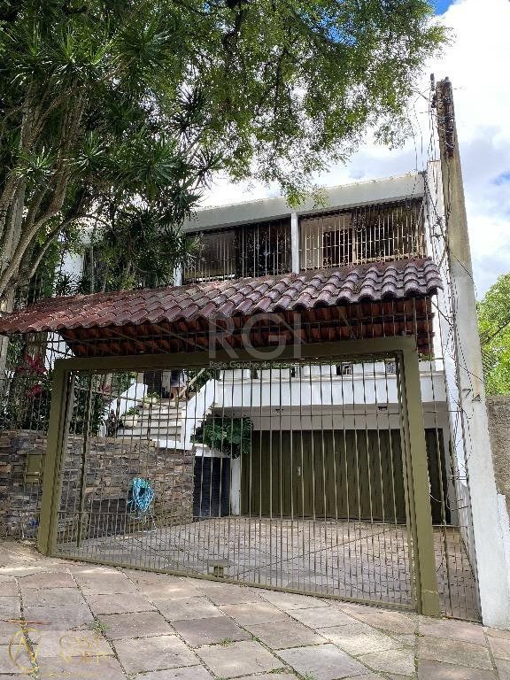 Casa à venda com 3 quartos, 526m², 1 suíte, 5 vagas, Avenida Icaraí no bairro Cristal em Porto Alegre