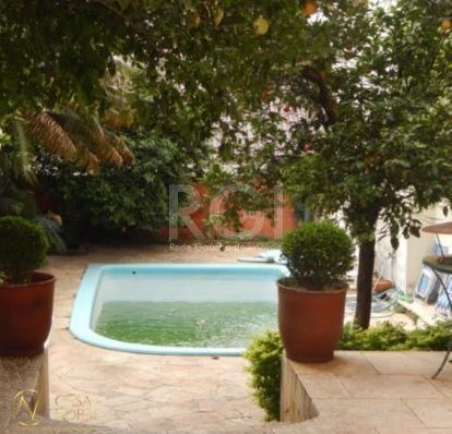 Casa à venda com 4 quartos, 283m², 1 suíte, 4 vagas, Avenida Mariland no bairro São João em Porto Alegre