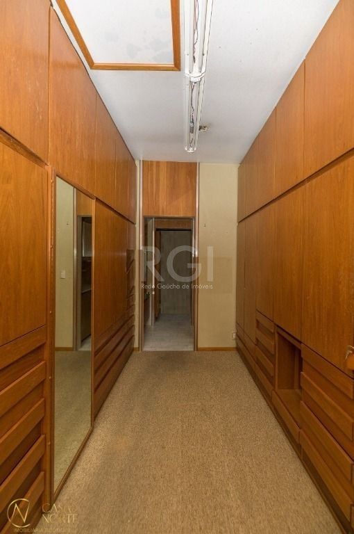 Casa à venda com 4 quartos, 388m², 3 suítes, 4 vagas, Rua Pedro Chaves Barcelos no bairro Auxiliadora em Porto Alegre