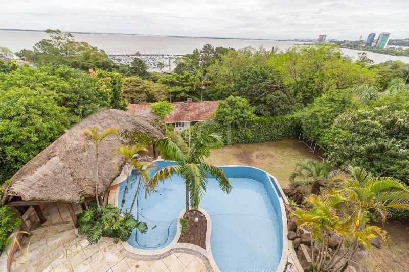 Casa à venda com 4 quartos, 1107m², 4 suítes, 8 vagas, Rua Bororo no bairro Vila Assunção em Porto Alegre
