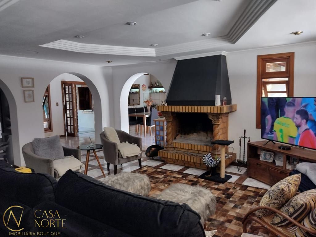 Casa à venda com 4 quartos, 350m², 2 suítes, 4 vagas, Rua dos Minuanos no bairro Espírito Santo em Porto Alegre
