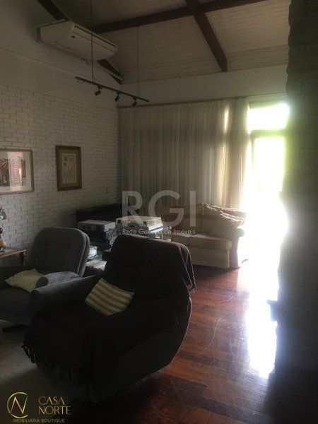 Casa à venda com 3 quartos, 406m², 1 suíte, 4 vagas, Rua Balduino Roehrig no bairro Três Figueiras em Porto Alegre