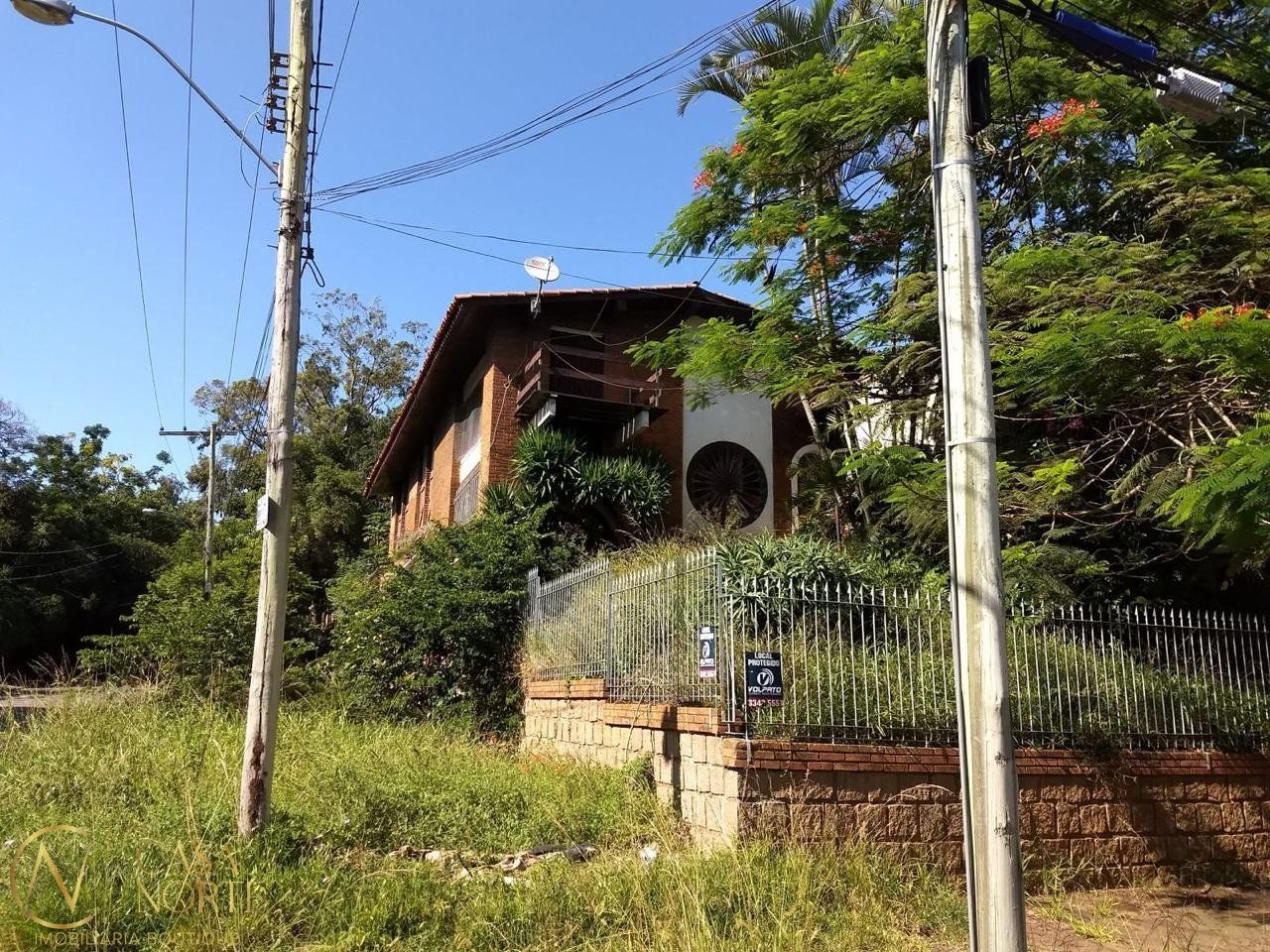 Casa à venda com 3 quartos, 300m², 3 vagas, Rua Cleveland no bairro Santa Tereza em Porto Alegre
