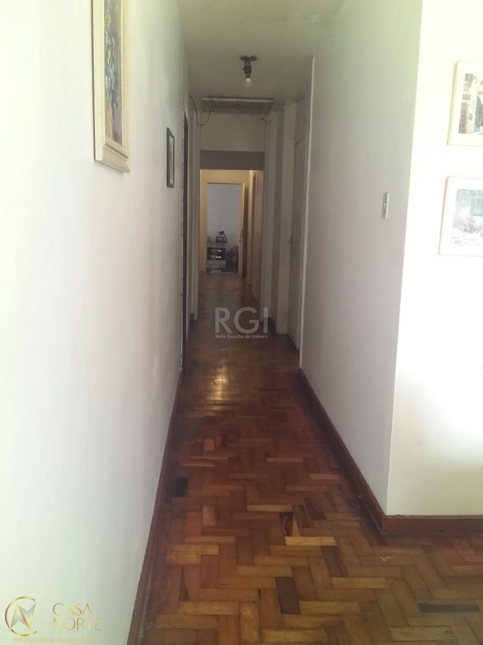 Casa à venda com 4 quartos, 176m², 1 suíte, 2 vagas, Rua Januario Scalzilli no bairro Santa Tereza em Porto Alegre