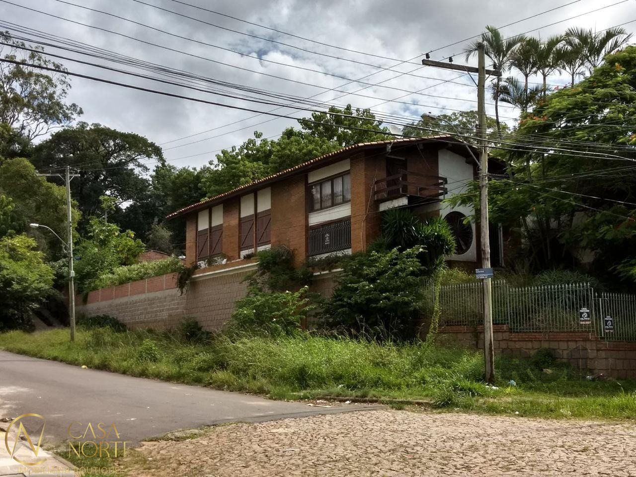 Casa à venda com 3 quartos, 300m², 3 vagas, Rua Cleveland no bairro Santa Tereza em Porto Alegre