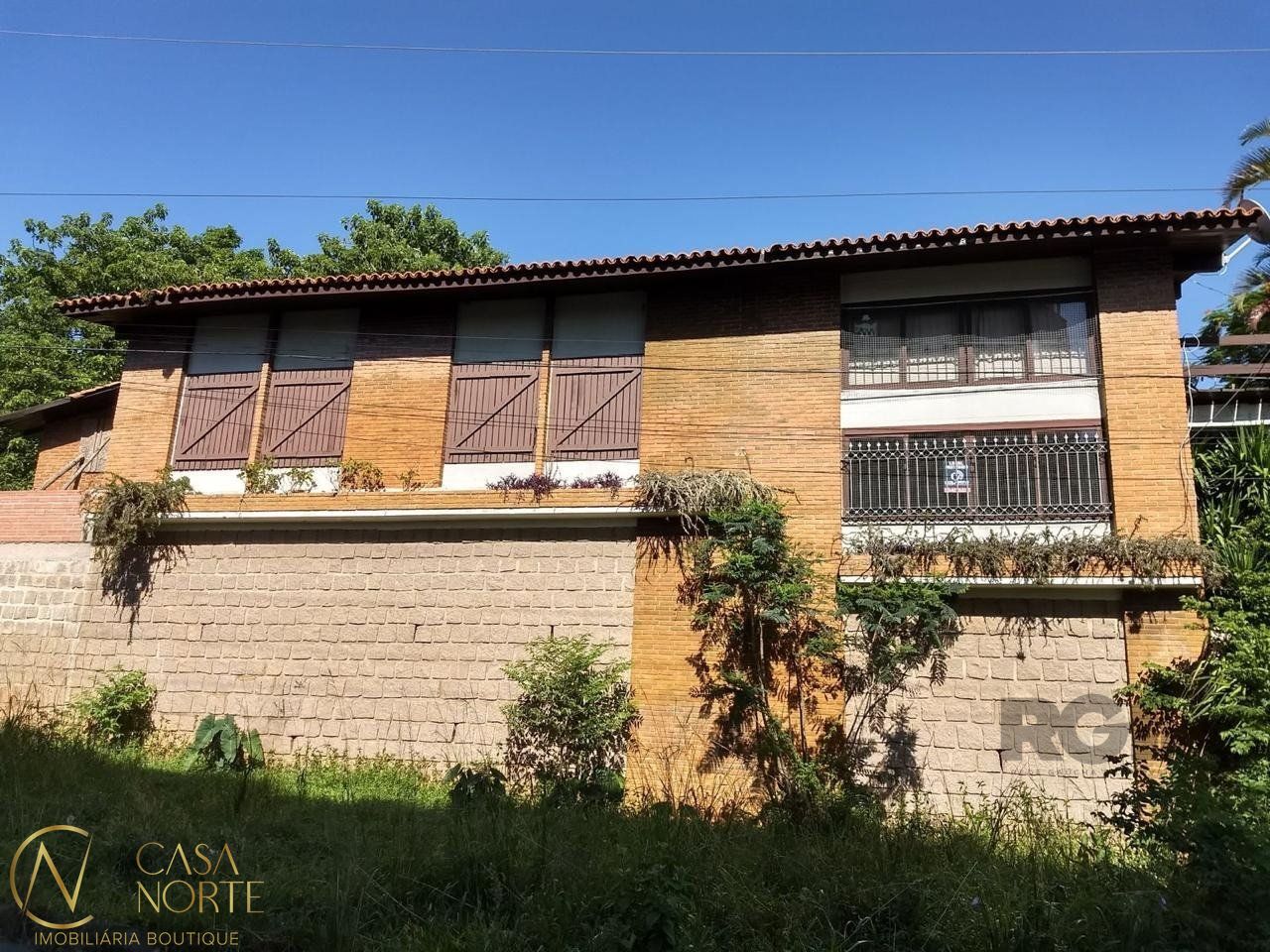 Casa à venda com 3 quartos, 300m², 3 vagas, Rua Cleveland no bairro Santa Tereza em Porto Alegre