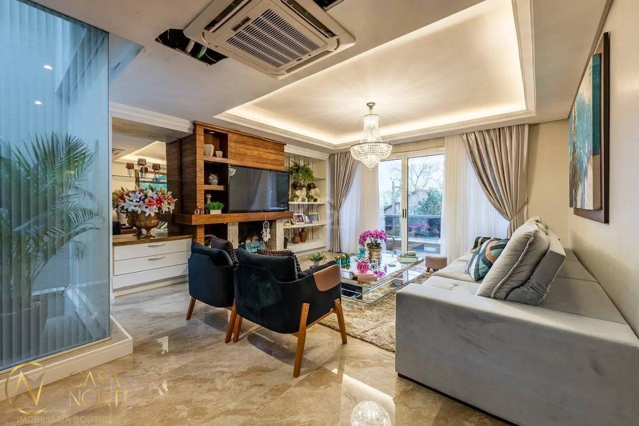 Casa à venda com 3 quartos, 347m², 3 suítes, 3 vagas, Rua Caete no bairro Vila Assunção em Porto Alegre