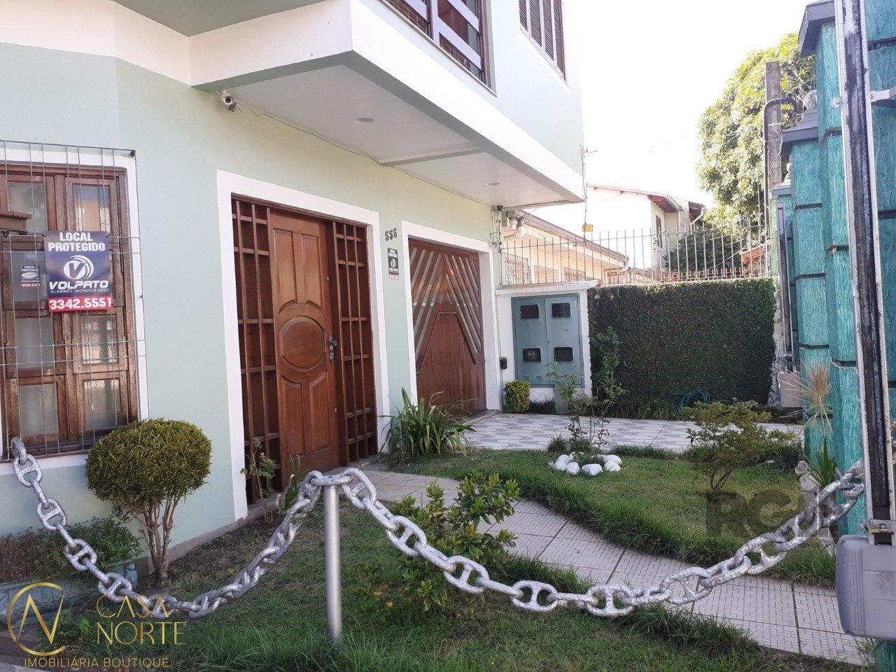 Casa à venda com 4 quartos, 320m², 3 vagas, Rua Doutor Telmo Vergara no bairro Partenon em Porto Alegre