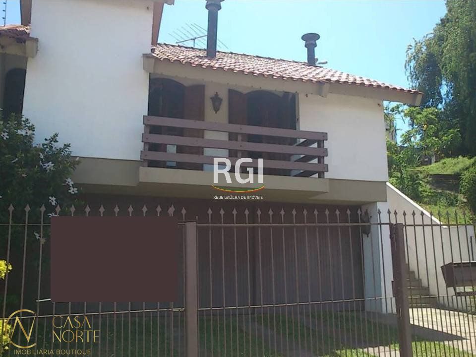 Casa à venda com 3 quartos, 251m², 2 suítes, 3 vagas, Rua Paulo Bento Lobato no bairro Jardim Lindóia em Porto Alegre