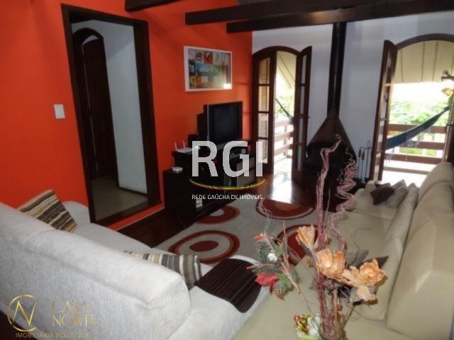 Casa à venda com 3 quartos, 251m², 2 suítes, 3 vagas, Rua Paulo Bento Lobato no bairro Jardim Lindóia em Porto Alegre