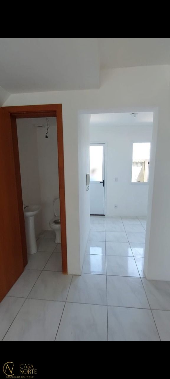 Sobrado à venda com 3 quartos, 63m², 1 suíte, Rua Dorival Castilhos Machado no bairro Aberta dos Morros em Porto Alegre