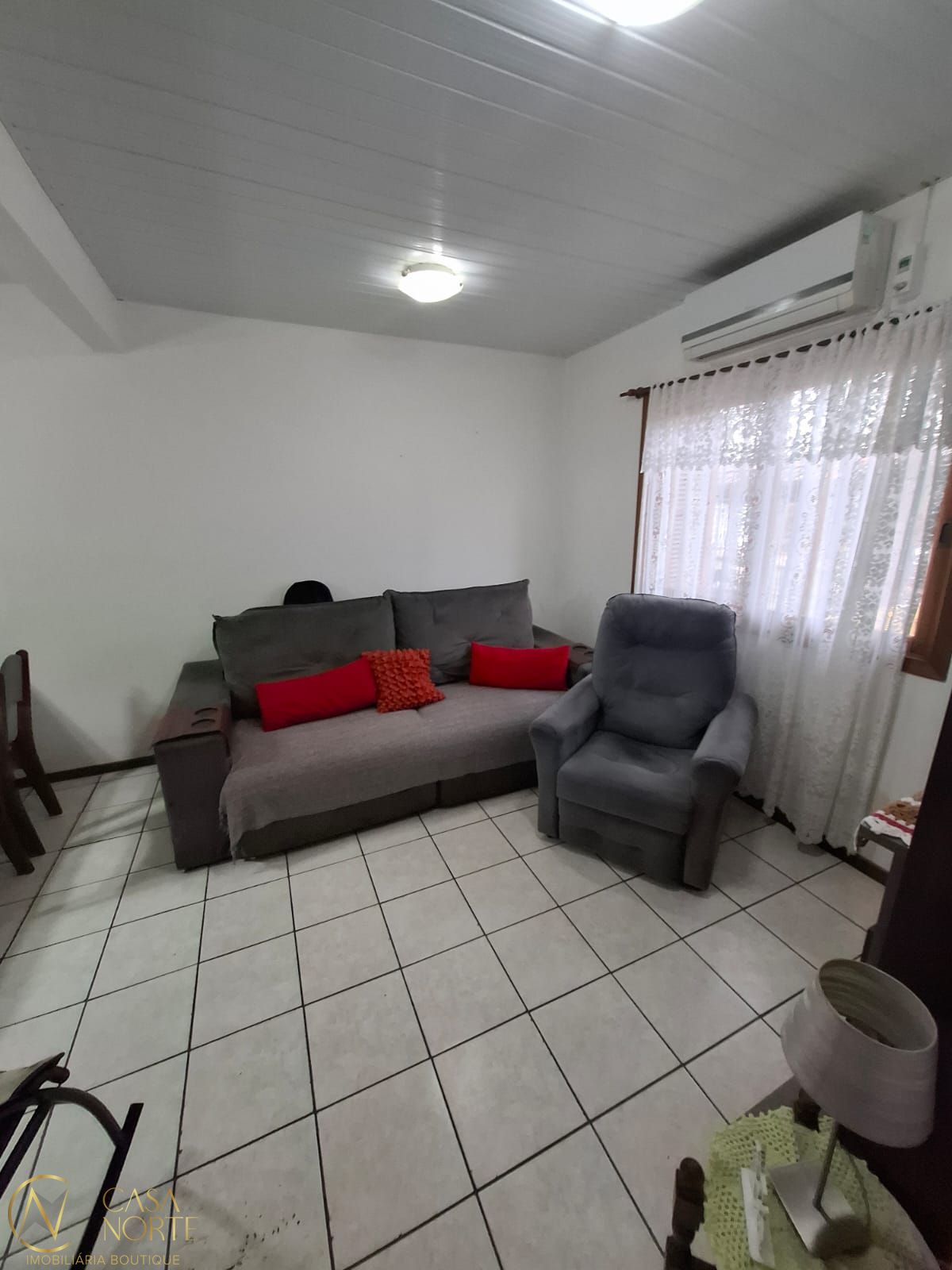 Casa à venda com 3 quartos, 58m², 2 vagas, Rua Darcy de Bastos Germann no bairro Hípica em Porto Alegre
