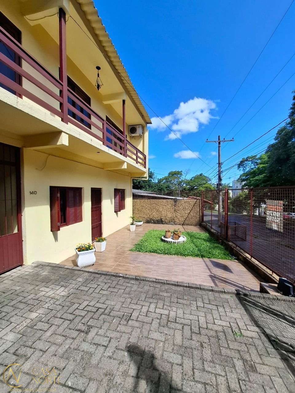Casa à venda com 4 quartos, 254m², 4 vagas, Rua Ventos do Sul no bairro Vila Nova em Porto Alegre