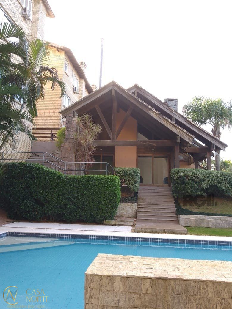 Casa de Condomínio à venda com 3 quartos, 212m², 1 suíte, 2 vagas, Rua Professor Xavier Simoes no bairro Sétimo Céu em Porto Alegre