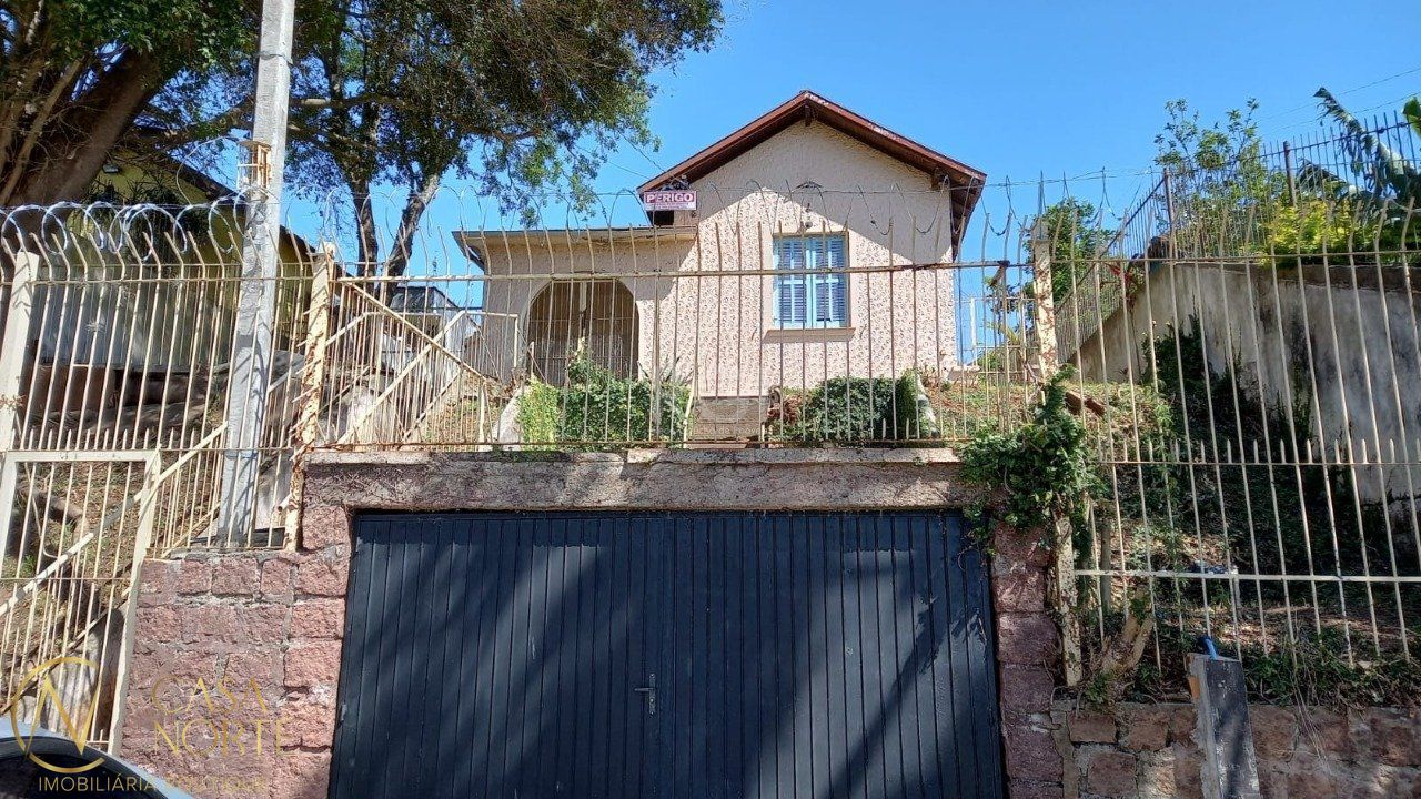 Casa à venda com 4 quartos, 108m², 1 vaga, Avenida Felipe Weimann no bairro Santa Tereza em Porto Alegre
