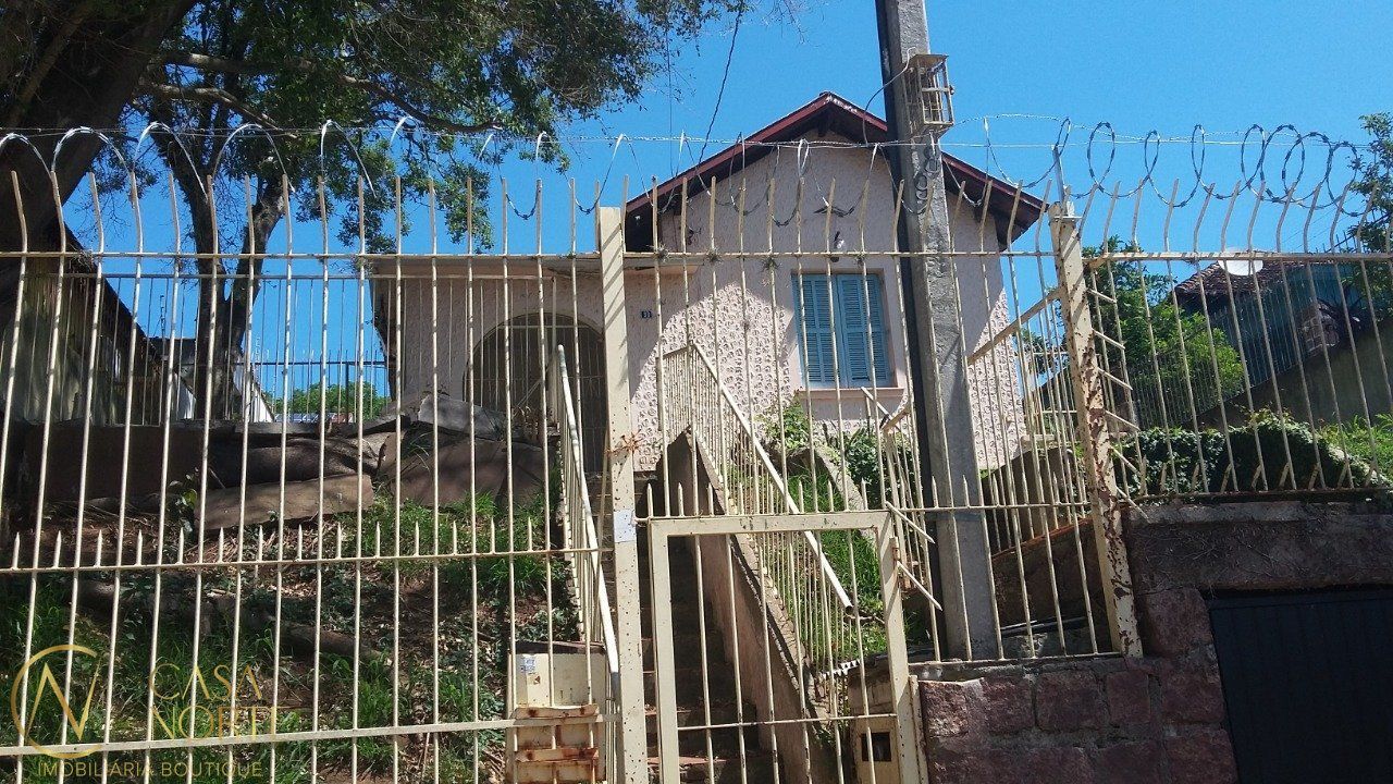 Casa à venda com 4 quartos, 108m², 1 vaga, Avenida Felipe Weimann no bairro Santa Tereza em Porto Alegre
