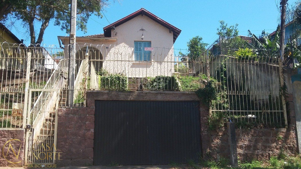 Casa à venda com 4 quartos, 108m², 1 vaga, Avenida Felipe Weimann no bairro Santa Tereza em Porto Alegre