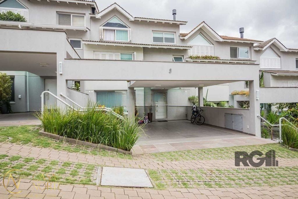 Casa de Condomínio à venda com 4 quartos, 324m², 4 suítes, 3 vagas, Rua João Caetano no bairro Três Figueiras em Porto Alegre