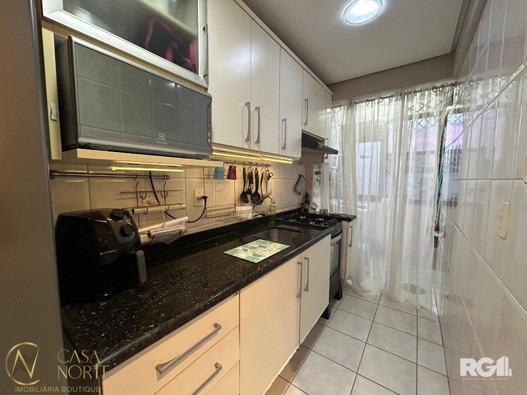 Apartamento à venda com 3 quartos, 95m², 1 suíte, 2 vagas, Rua Roque Calage no bairro Passo da Areia em Porto Alegre