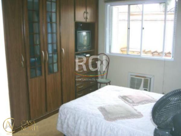 Casa de Condomínio à venda com 3 quartos, 84m², 1 vaga, Rua Tenente Ary Tarrago no bairro Protásio Alves em Porto Alegre