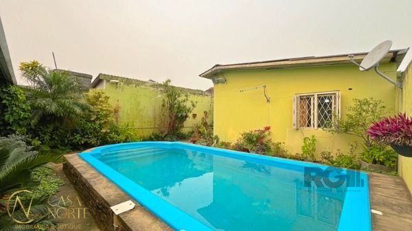 Casa à venda com 3 quartos, 155m², 2 vagas, Rua Otelo Rosa no bairro Ipanema em Porto Alegre
