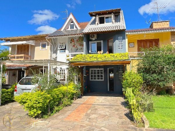 Casa de Condomínio à venda com 3 quartos, 132m², 1 suíte, 2 vagas, Avenida Juca Batista no bairro Cavalhada em Porto Alegre