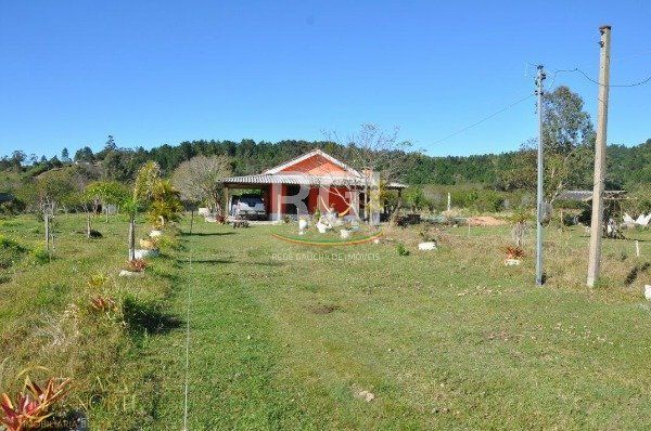 Sítio à venda com 2 quartos, 100m², 1 vaga, Estrada para Itapuan no bairro Lami em Porto Alegre