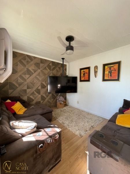 Casa à venda com 3 quartos, 91m², 1 suíte, 2 vagas, Rua Jóia no bairro Vila Nova em Porto Alegre