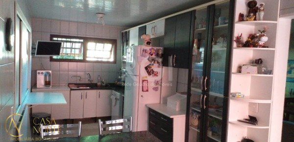 Casa à venda com 4 quartos, 220m², 1 suíte, 2 vagas, Travessa Nossa Senhora de Lourdes no bairro Tristeza em Porto Alegre