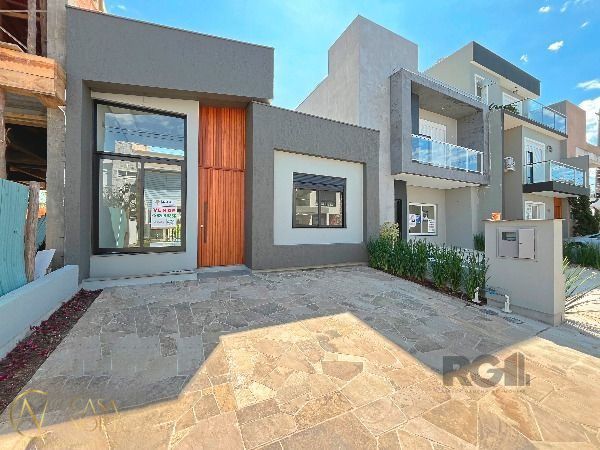 Casa à venda com 3 quartos, 90m², 1 suíte, 2 vagas, Rua Eroni Soares Machado no bairro Hípica em Porto Alegre