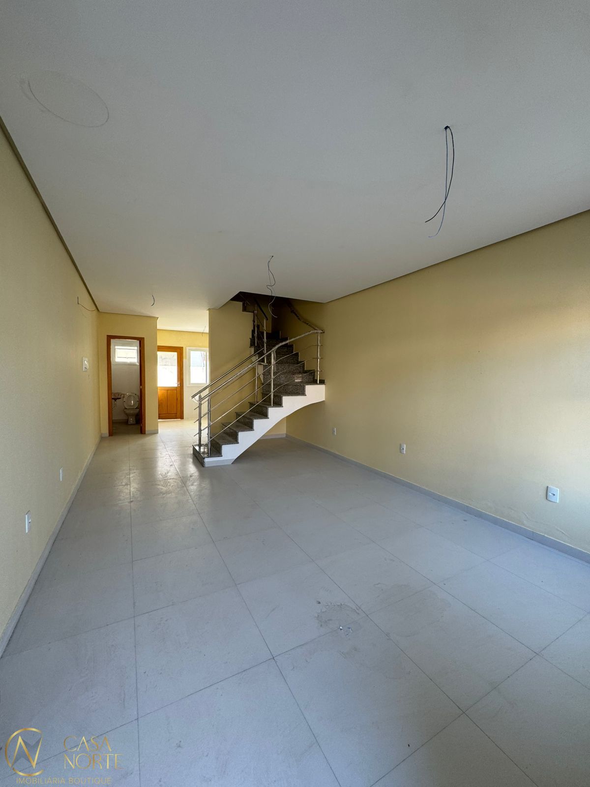 Casa à venda com 3 quartos, 126m², 3 suítes, 2 vagas, Rua Itacyr Rossi no bairro Guarujá em Porto Alegre